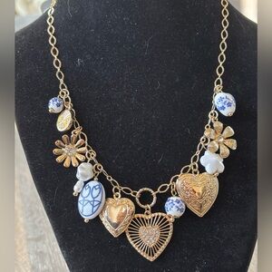 Hannah Gold Necklace with blue, white and gold charms. Adorable 16-19” NEW